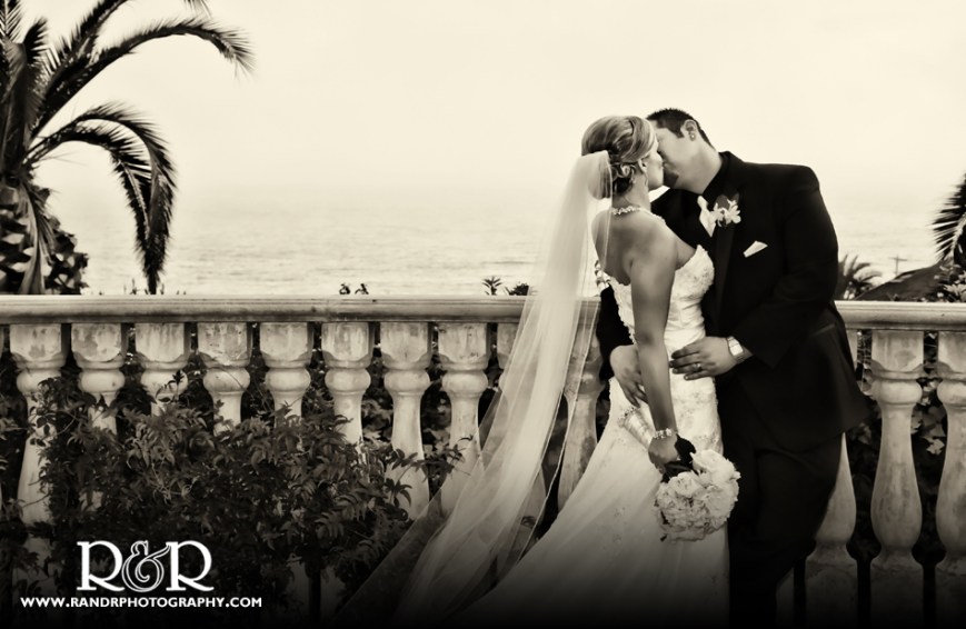 A romantic kiss on the balcony of the Bel Air Bay Club